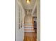 Entryway with wood floors leading to the stairs and the rest of the home at 491 Princeton Ne Way, Atlanta, GA 30307