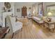 A traditionally styled living room with hardwood floors, fireplace, and bright natural light at 491 Princeton Ne Way, Atlanta, GA 30307