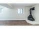 Basement fireplace and accent painted brick wall at 5802 Oakleaf Dr, Stone Mountain, GA 30087