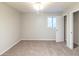 Bedroom featuring neutral tones and carpeting at 5802 Oakleaf Dr, Stone Mountain, GA 30087