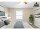 Virtually staged bedroom with a window and decorative accents at 5802 Oakleaf Dr, Stone Mountain, GA 30087