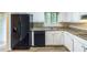 Kitchen featuring stainless steel appliances, granite countertops, and ample cabinet space at 5802 Oakleaf Dr, Stone Mountain, GA 30087