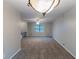 Loft featuring new carpet, a ceiling fan, and natural light at 5802 Oakleaf Dr, Stone Mountain, GA 30087
