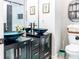Stylish bathroom featuring dual vessel sinks and modern black cabinetry at 955 Coleman Sw St, Atlanta, GA 30310