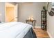 Inviting bedroom with hardwood floors, elegant decor, and warm, ambient lighting at 955 Coleman Sw St, Atlanta, GA 30310