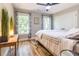 Bright bedroom with hardwood floors, large windows, and a cozy, inviting atmosphere at 955 Coleman Sw St, Atlanta, GA 30310