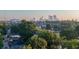 Scenic view of the city skyline amidst lush greenery and charming neighborhood houses at 955 Coleman Sw St, Atlanta, GA 30310