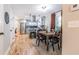 Charming dining area open to the kitchen, featuring hardwood floors and stylish decor at 955 Coleman Sw St, Atlanta, GA 30310