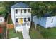Inviting two-story home showcasing double front porches and a well-maintained yard in a desirable location at 955 Coleman Sw St, Atlanta, GA 30310