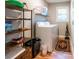 Bright laundry room features shelving and a washer and dryer at 955 Coleman Sw St, Atlanta, GA 30310