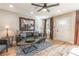 Bright and airy living room featuring hardwood floors, modern decor, and a comfortable seating area at 955 Coleman Sw St, Atlanta, GA 30310