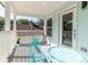 Charming covered porch with cozy seating and an open view at 955 Coleman Sw St, Atlanta, GA 30310
