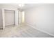 Neutral bedroom featuring a ceiling fan and a closet at 2263 Leicester Se Way, Atlanta, GA 30316