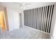 Minimal bedroom with neutral tones, carpet flooring, a closet, and a ceiling fan at 2263 Leicester Se Way, Atlanta, GA 30316