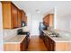 Functional kitchen featuring wood cabinets, practical layout, and essential appliances at 2263 Leicester Se Way, Atlanta, GA 30316