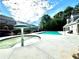Beautiful community swimming pool featuring a splash pad, lounging area, and nearby clubhouse at 2263 Leicester Se Way, Atlanta, GA 30316