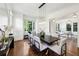 Elegant dining room with modern light fixtures, a large table, and stylish seating for formal gatherings at 331 Peachtree Ne Ave, Atlanta, GA 30305