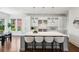 Bright kitchen featuring stainless steel appliances, modern pendant lighting and marble countertops at 331 Peachtree Ne Ave, Atlanta, GA 30305