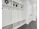 This mudroom has shiplap, storage, and bench seating at 331 Peachtree Ne Ave, Atlanta, GA 30305