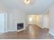 Spacious living room with fireplace and hardwood floors at 8051 Trinity Park Dr, Riverdale, GA 30296
