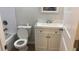 Updated bathroom featuring a tub, new toilet and new vanity with ample counter space at 1304 Old Coach Sw Rd, Marietta, GA 30008
