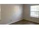 Bright bedroom with new blinds, and a neutral color palette, ready for personal touches at 1304 Old Coach Sw Rd, Marietta, GA 30008