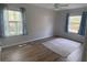 Inviting bedroom with carpet, ceiling fan, and natural light, ideal for relaxation and rest at 1304 Old Coach Sw Rd, Marietta, GA 30008