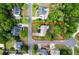 An aerial view of a home featuring mature trees, a long driveway, and a well-maintained yard, surrounded by lush greenery at 31 Clearview Dr, Cartersville, GA 30121