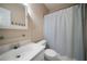 Modest bathroom with a single sink vanity, basic fixtures, and shower curtain at 31 Clearview Dr, Cartersville, GA 30121