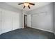 Spacious bedroom with a closet and a decorative shelf with a light gray painted walls at 31 Clearview Dr, Cartersville, GA 30121