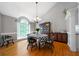 Bright dining room with hardwood floors, high ceilings, and a view of the backyard at 31 Clearview Dr, Cartersville, GA 30121