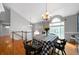 Bright dining room with hardwood floors, high ceilings, and a view of the upper level at 31 Clearview Dr, Cartersville, GA 30121