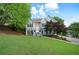 Charming home with a well-manicured lawn, beautiful landscaping and traditional architectural details at 31 Clearview Dr, Cartersville, GA 30121