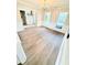 Bright dining room with wood flooring and views out of two large windows at 515 Sherwin Ct, Mcdonough, GA 30252