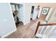 Clean foyer with a decorative rug and a view of the front door, featuring a wreath at 515 Sherwin Ct, Mcdonough, GA 30252
