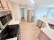 The kitchen has stainless steel appliances and white countertops at 515 Sherwin Ct, Mcdonough, GA 30252