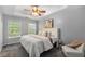 This bedroom features a trey ceiling, neutral paint colors, and plush carpeting at 833 Charles Bank Se Ave, Atlanta, GA 30312