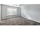 Large bedroom features a neutral color scheme, plush carpeting, and plenty of natural light at 833 Charles Bank Se Ave, Atlanta, GA 30312