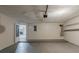 Garage interior view of an open door leading into a living room with a fireplace at 964 Chapman Ln, Stone Mountain, GA 30088