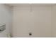 A blank storage room or closet with a white wall and outlet at 964 Chapman Ln, Stone Mountain, GA 30088