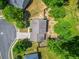 Birds eye view of home with lush, mature landscaping and well-maintained backyard at 182 Garden Manor Ct, Loganville, GA 30052