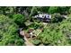 Stunning aerial view of an estate home, featuring a manicured lawn, charming gazebo, and lush landscaping at 2121 Ponce De Leon Ne Ave, Atlanta, GA 30307