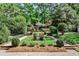 Lush backyard featuring a pond and gazebo surrounded by garden at 2121 Ponce De Leon Ne Ave, Atlanta, GA 30307