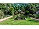 Backyard garden featuring a manicured pond at 2121 Ponce De Leon Ne Ave, Atlanta, GA 30307
