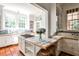 Bright kitchen with custom tile countertops, stainless appliances, and an island at 2121 Ponce De Leon Ne Ave, Atlanta, GA 30307