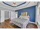 Well lit bedroom with hardwood floors and a closet at 3012 Keeneland Blvd, Mcdonough, GA 30252