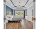 Spacious bedroom featuring hardwood floors, a trey ceiling, and natural light at 3012 Keeneland Blvd, Mcdonough, GA 30252