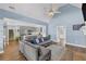 Open-concept living room featuring a high ceiling, fireplace, and seamless flow to the kitchen at 3012 Keeneland Blvd, Mcdonough, GA 30252