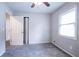 Bedroom with two doors, a window and carpet at 3664 Satellite Ter, Ellenwood, GA 30294