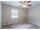 Bedroom with neutral walls, ceiling fan and carpet at 3664 Satellite Ter, Ellenwood, GA 30294